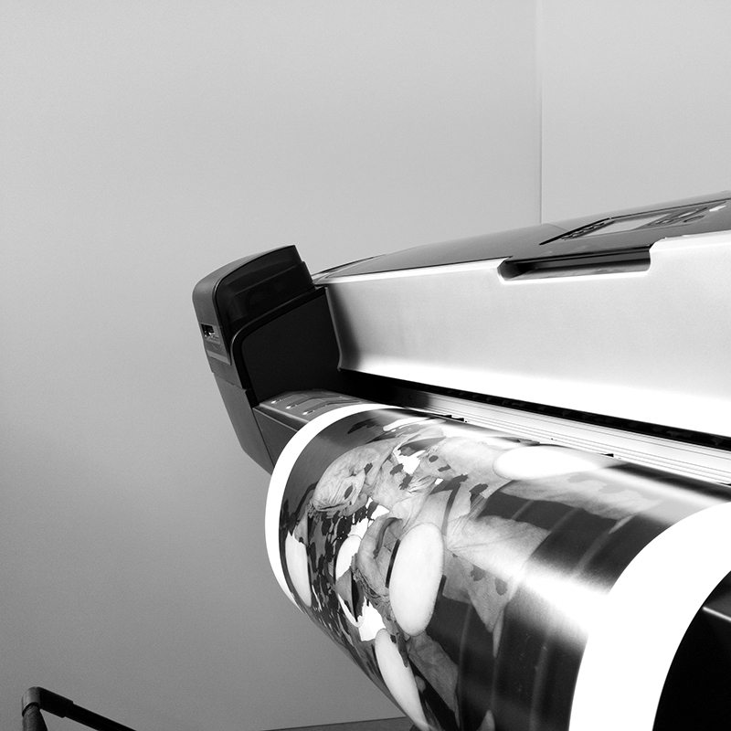 black and white picture of a professional large format printer